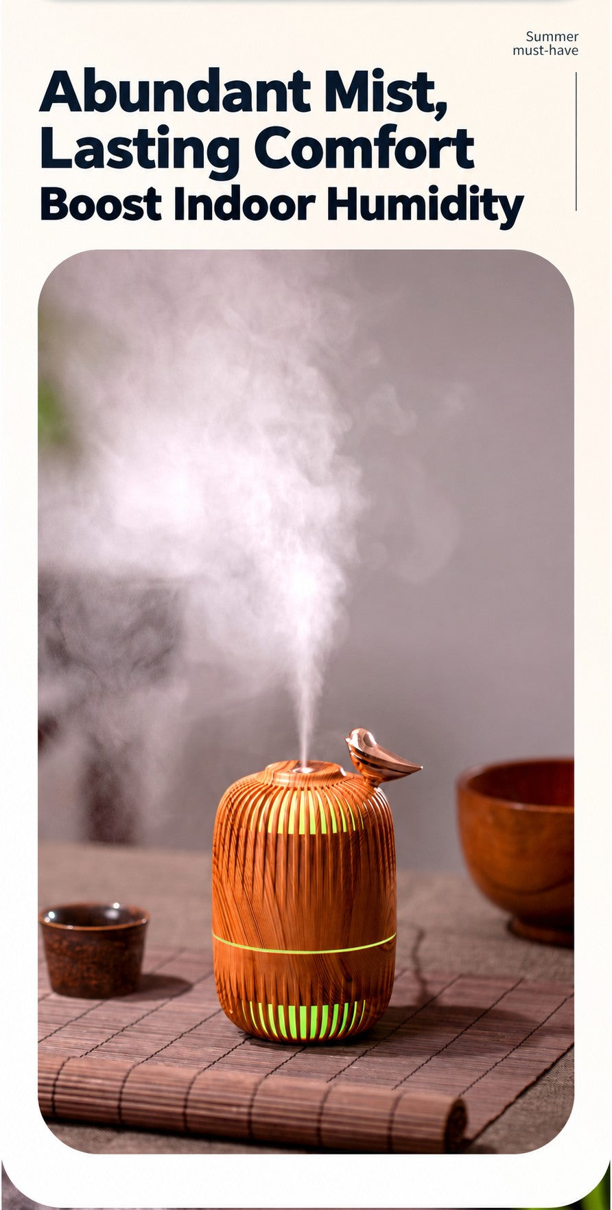 Dreambird Aroma Diffuser with a tall column of fine mist